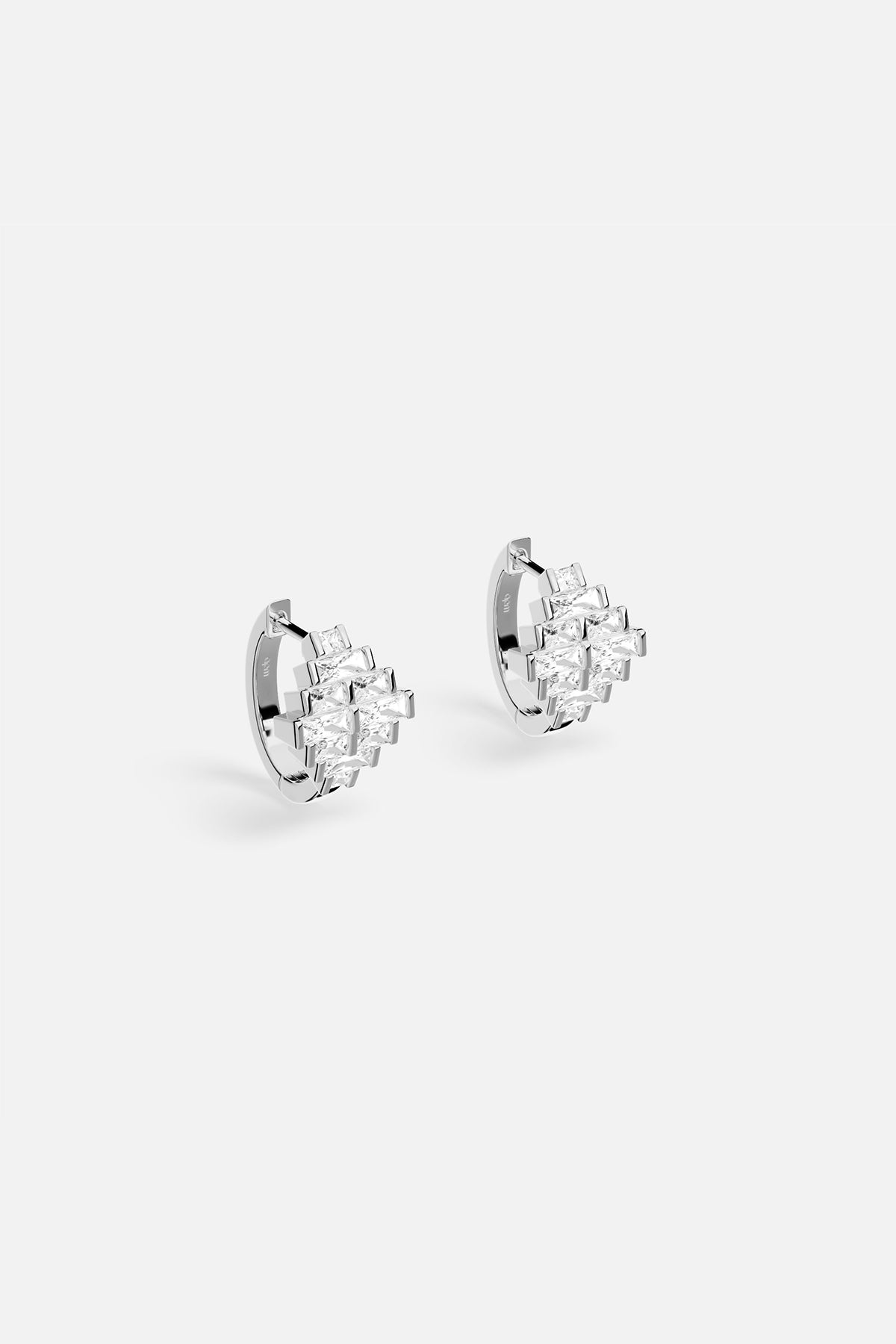 APM Hoop Earrings, a luminous cluster of brilliance in rhodium finish.