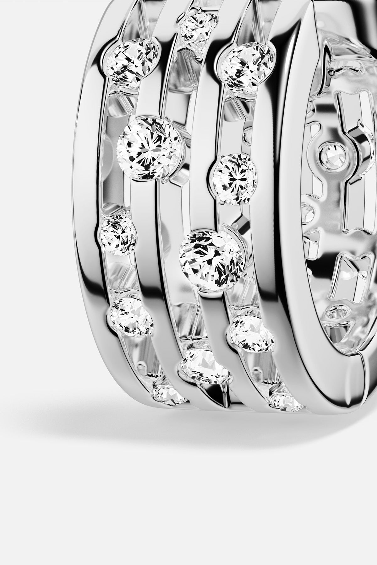 APM Ring in rhodium finish, layered brilliance with a modern, sparkling allure.