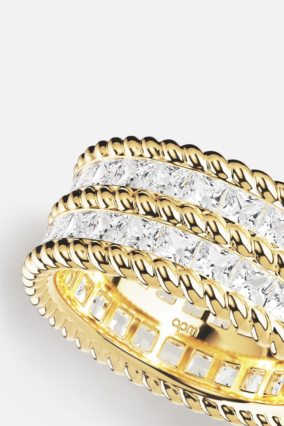 APM Ring in golden color, twisted elegance meets radiant sparkle.
