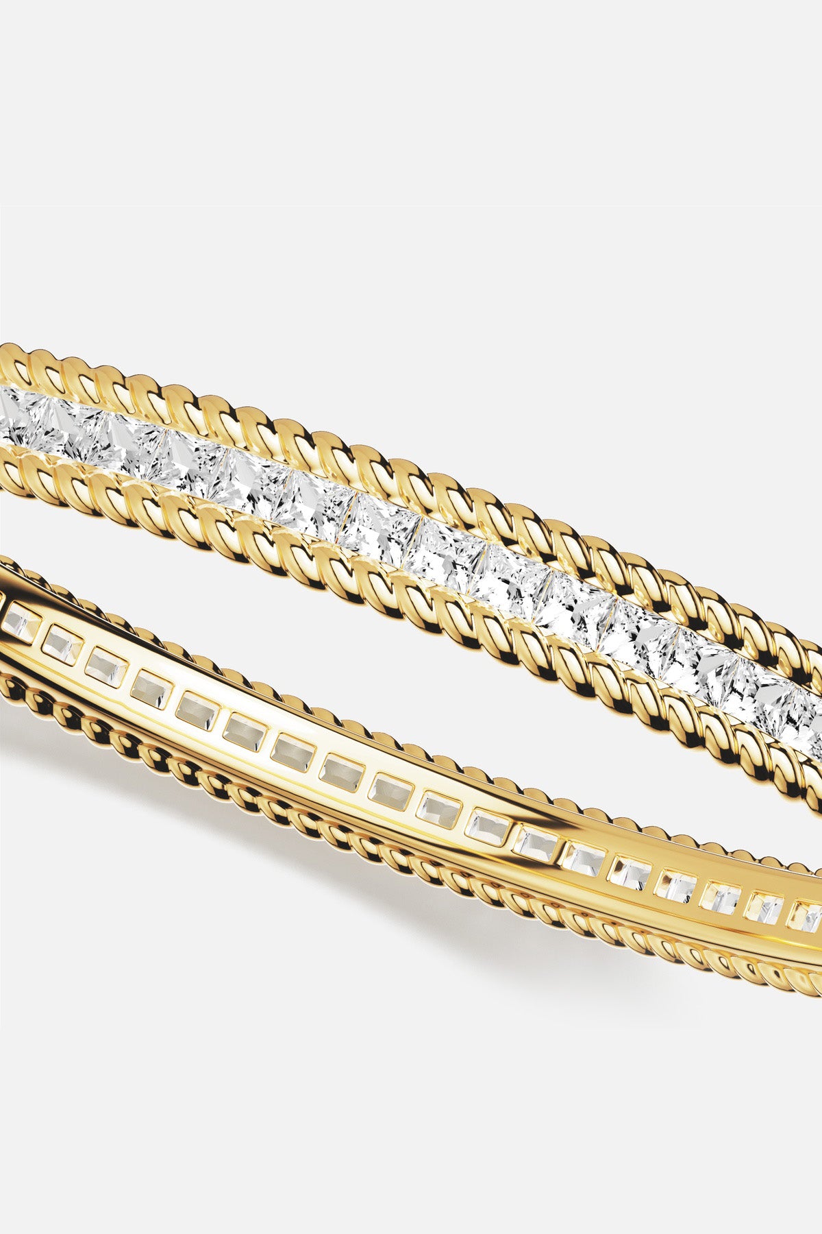 APM Bangle, twisted golden edges framing a luminous line of light.