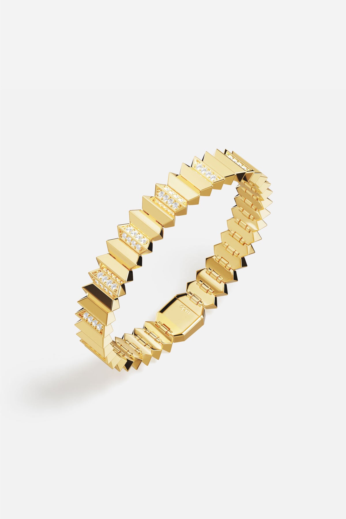 APM Bracelet in golden color, bold architectural edge with a modern glow.