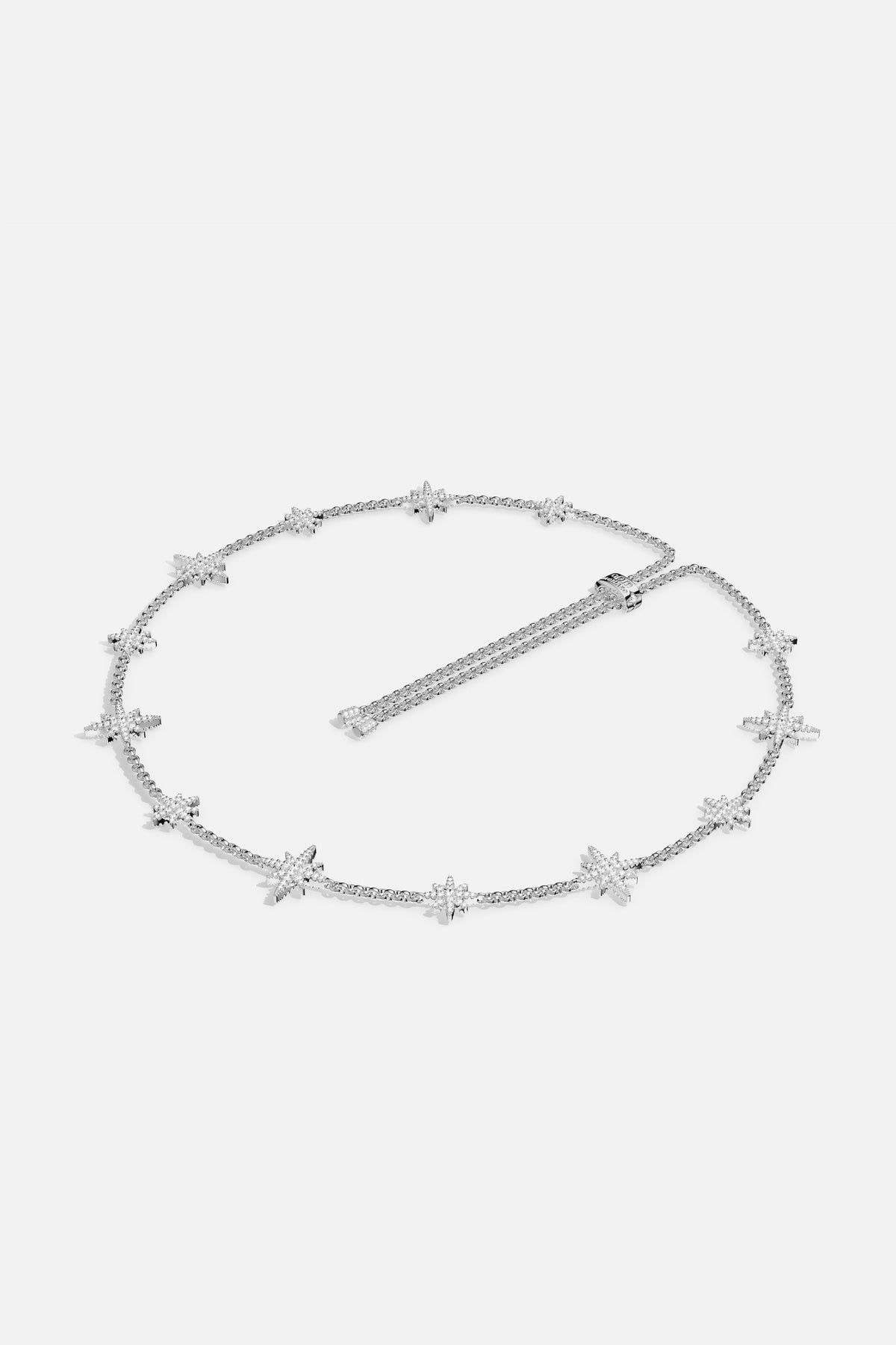 APM Météorites Necklace, a constellation of stars gracing the neckline with quiet radiance.