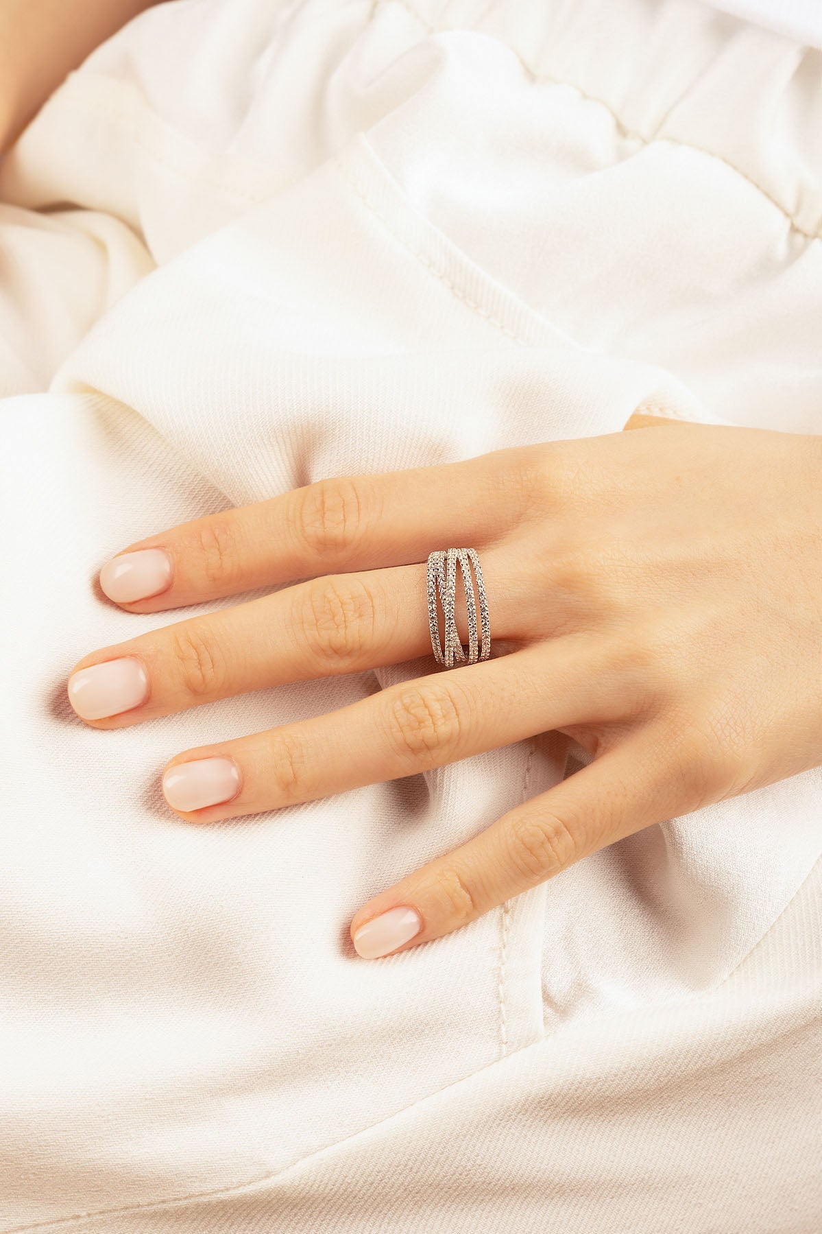 APM Monaco Five-Hoop Ring in Silver worn on hand