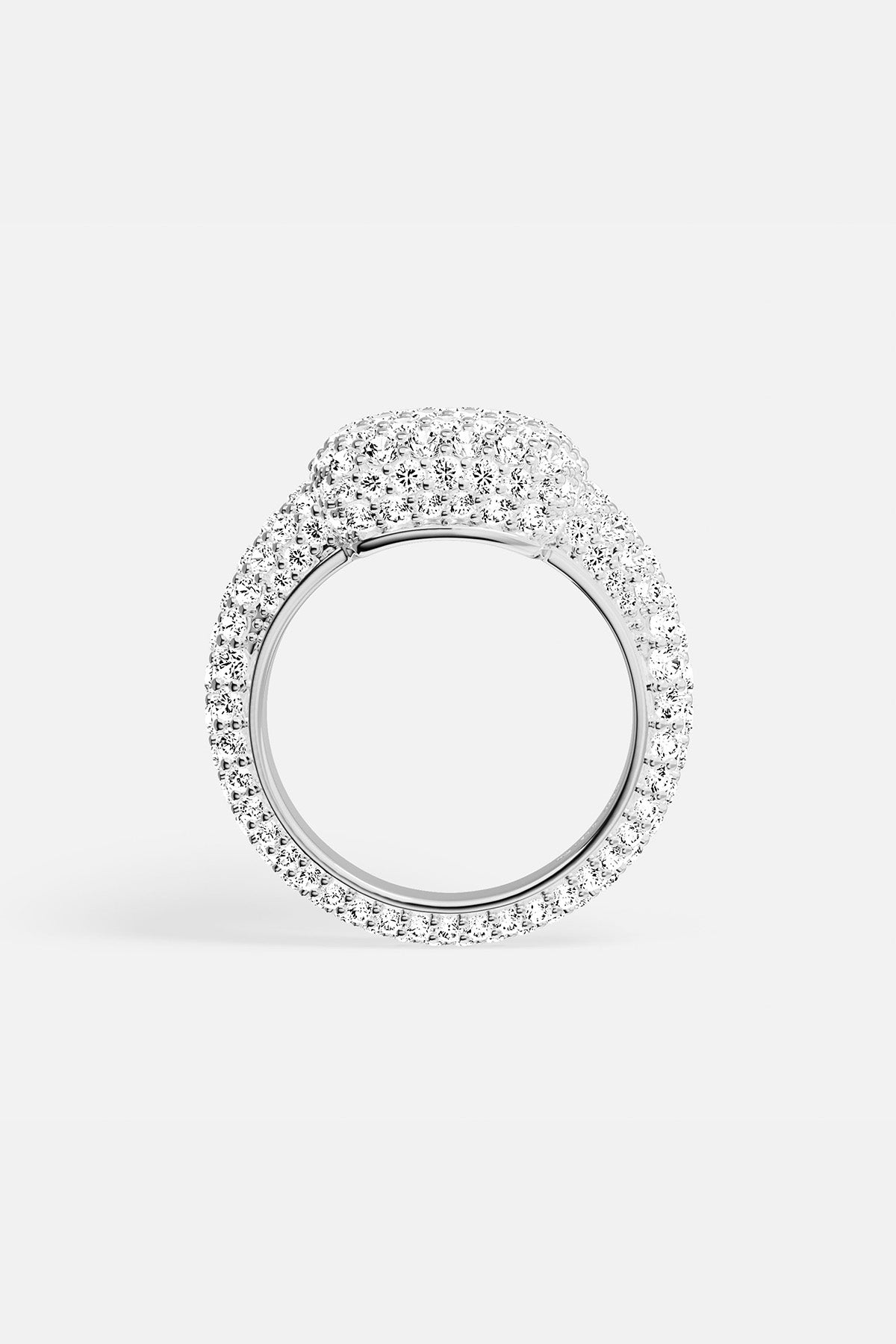 APM MONACO silver ring with circular design and embedded white stones on a white background