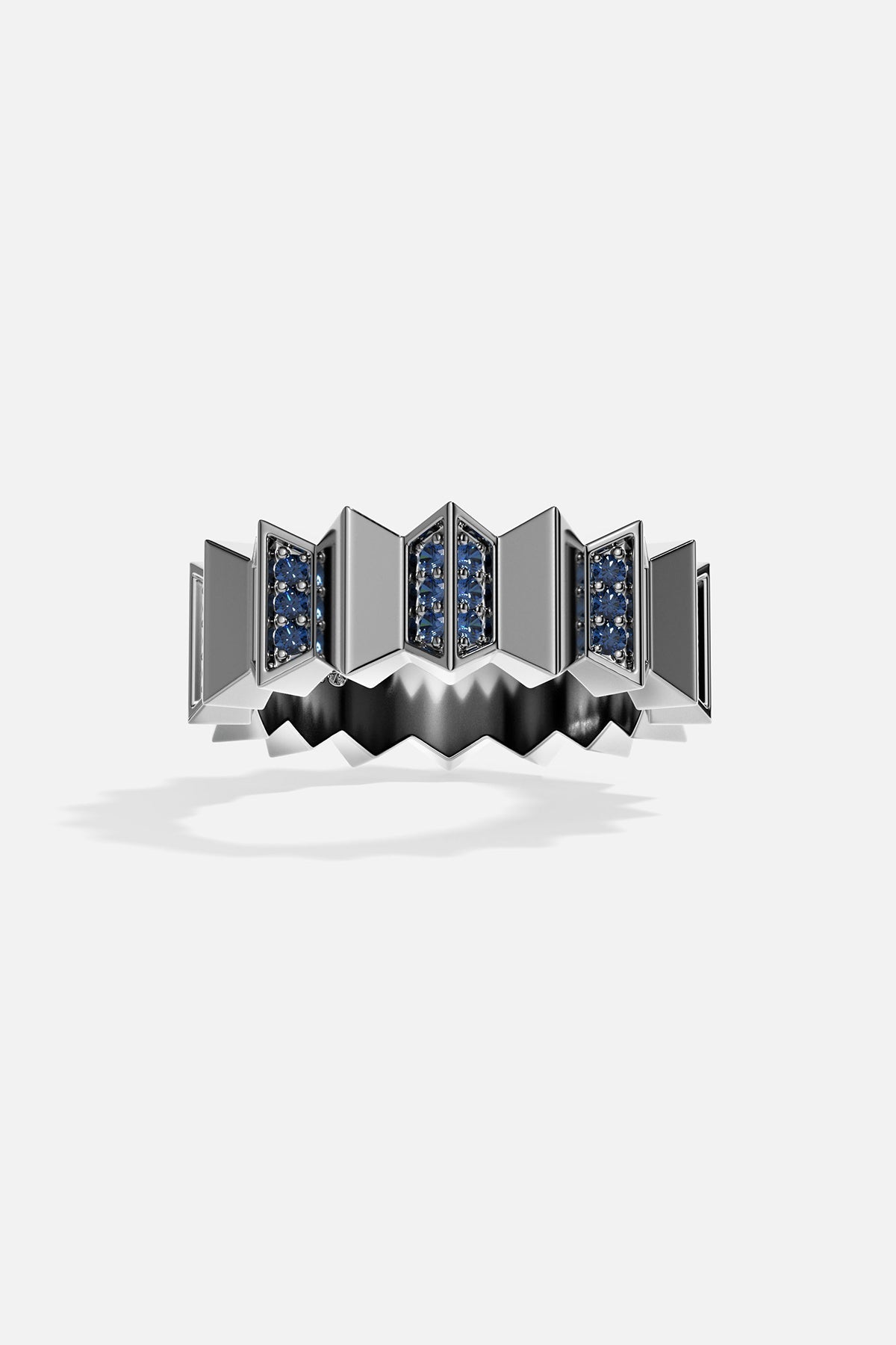 Dark grey silver ring with blue stones on a white background