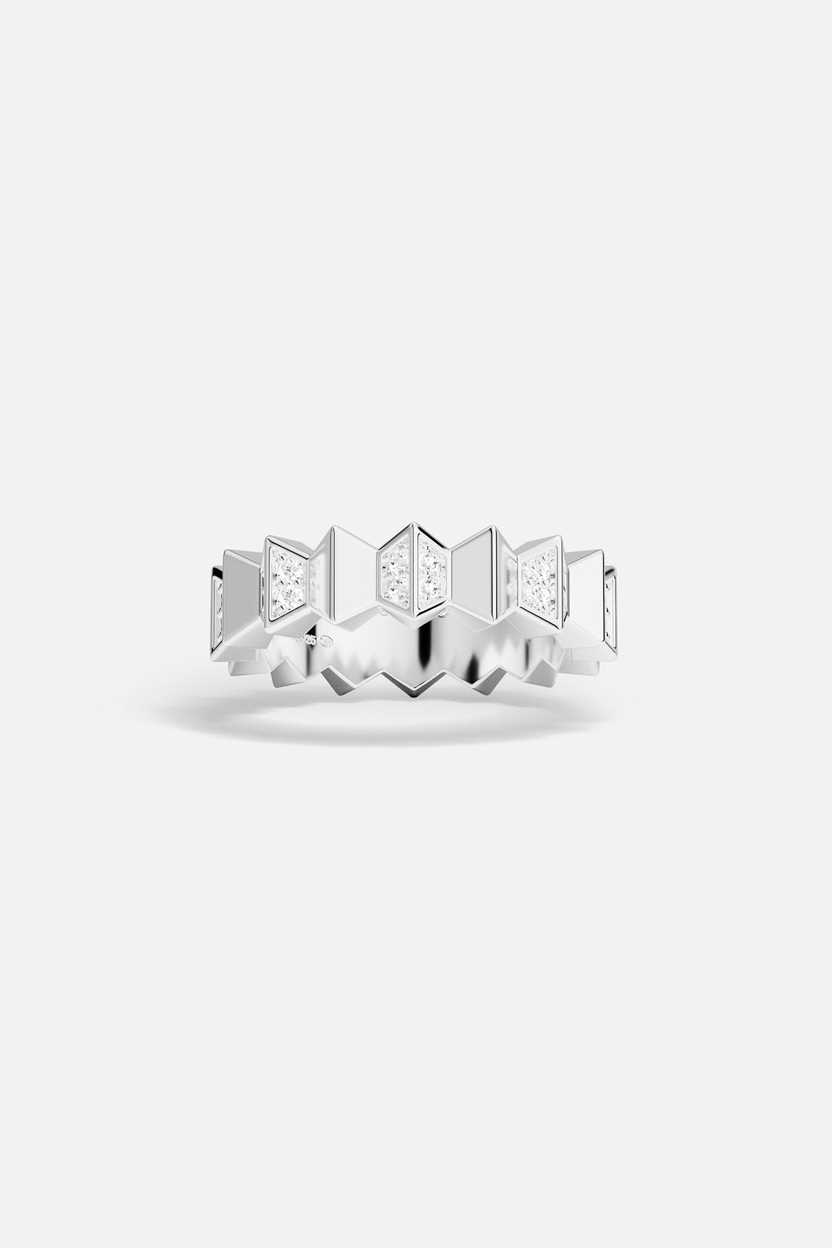 Silver ring with geometric design on a white background