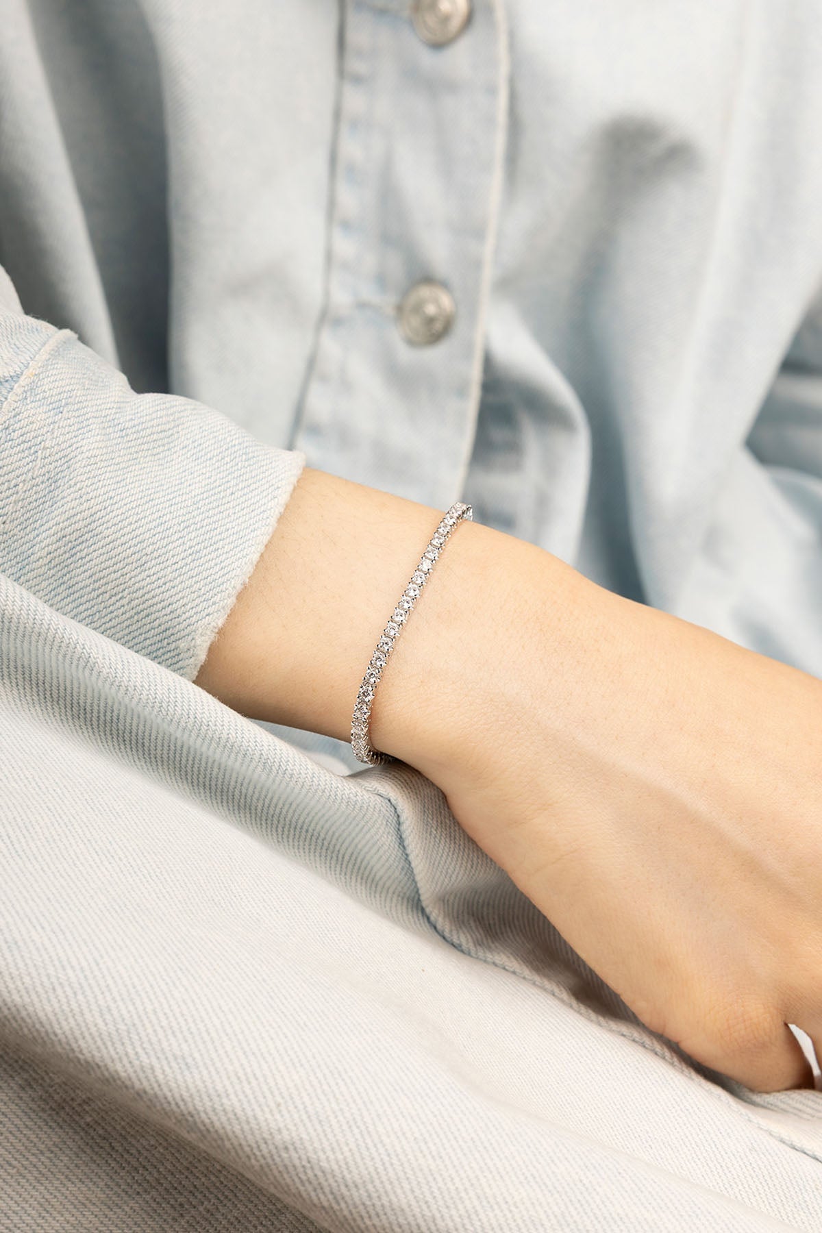 APM Monaco Tennis Bracelet in Silver worn on hand