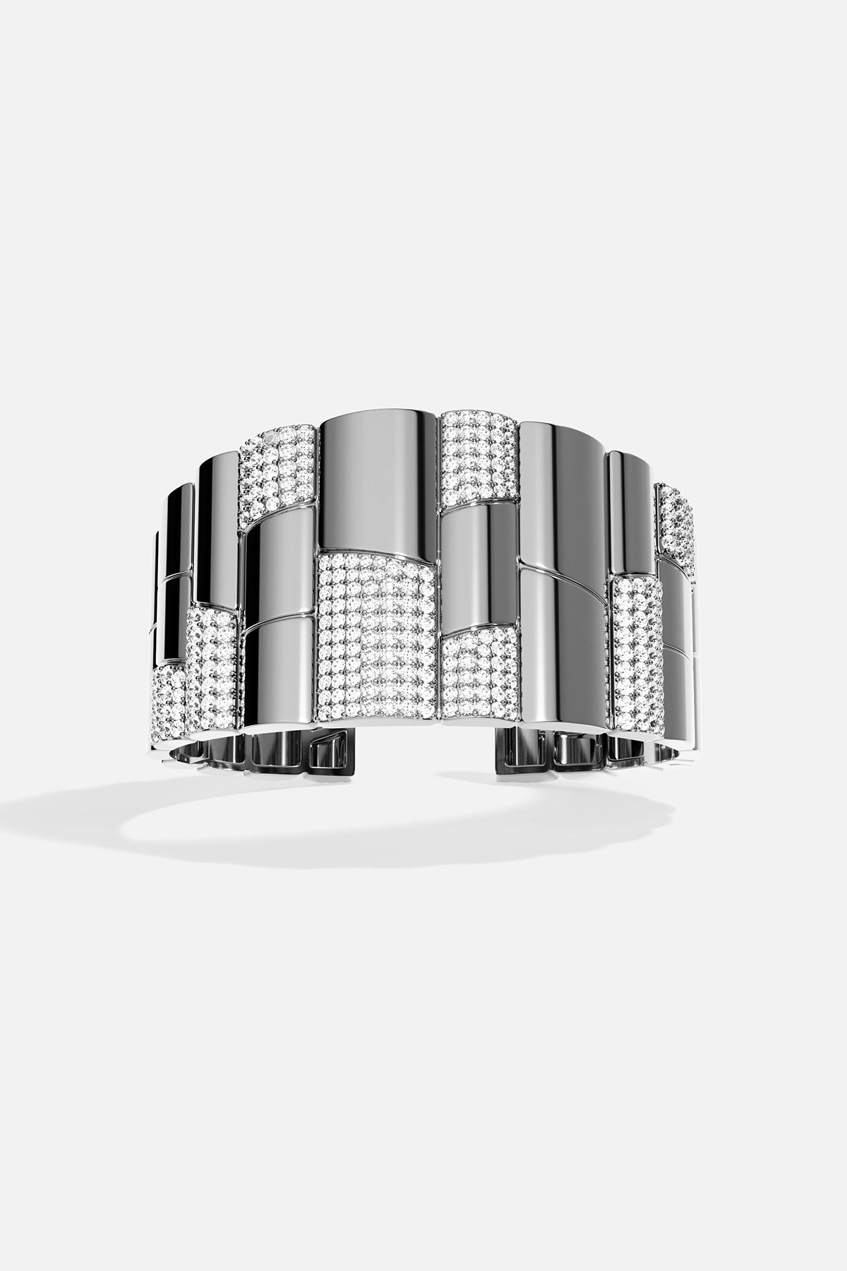 Dark grey silver bangle with white stones on a white background