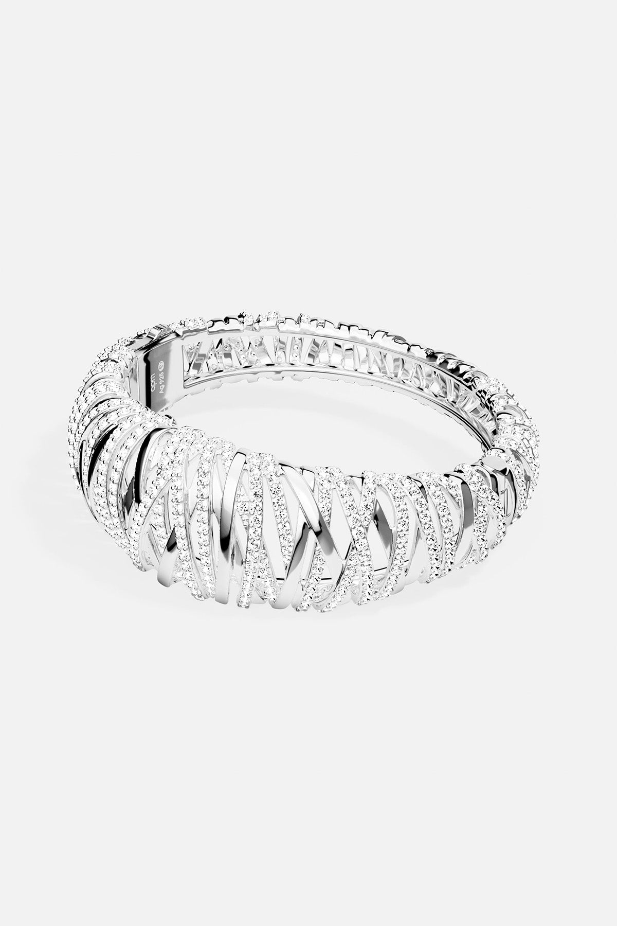APM MONACO enlace bracelet in silver with clear white stones on a white background