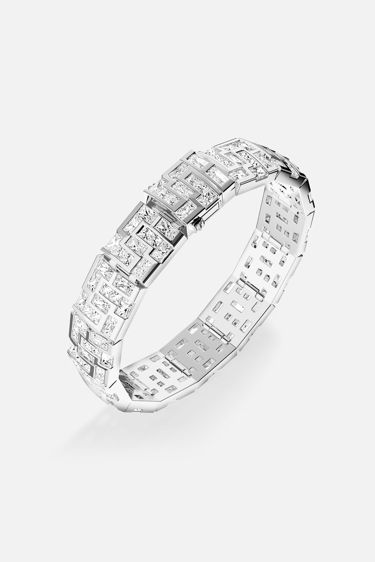 APM MONACO chunky labyrinth bracelet in silver with rectangular stones on a light gray background