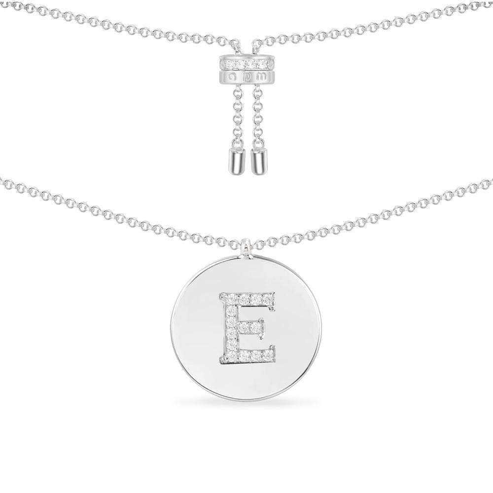 Necklaces APM Monaco: silver chain with adjustable clasp, circular pendant featuring a diamond-studded letter E.