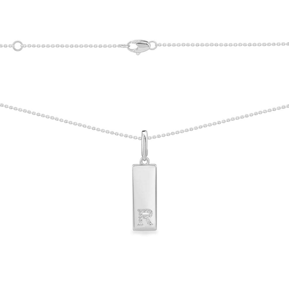 Necklaces APM Monaco: silver-tone chain with a rectangular pendant featuring a rhinestone-studded letter R.