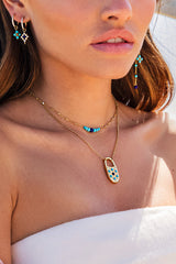 APM Monaco Blue Stone Lock Pendant Adjustable Necklace in Yellow Gold