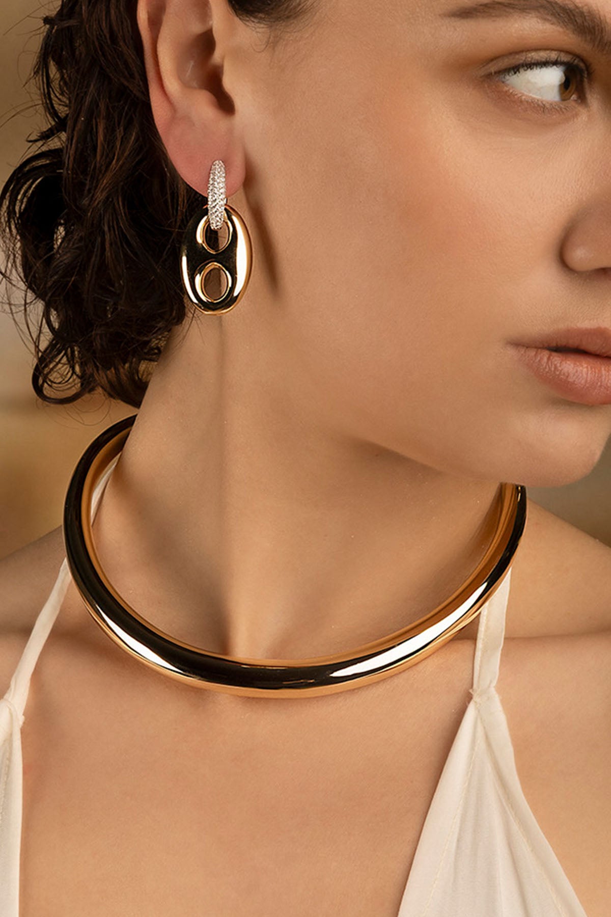APM Monaco Bold Choker in yellow gold worn on neck