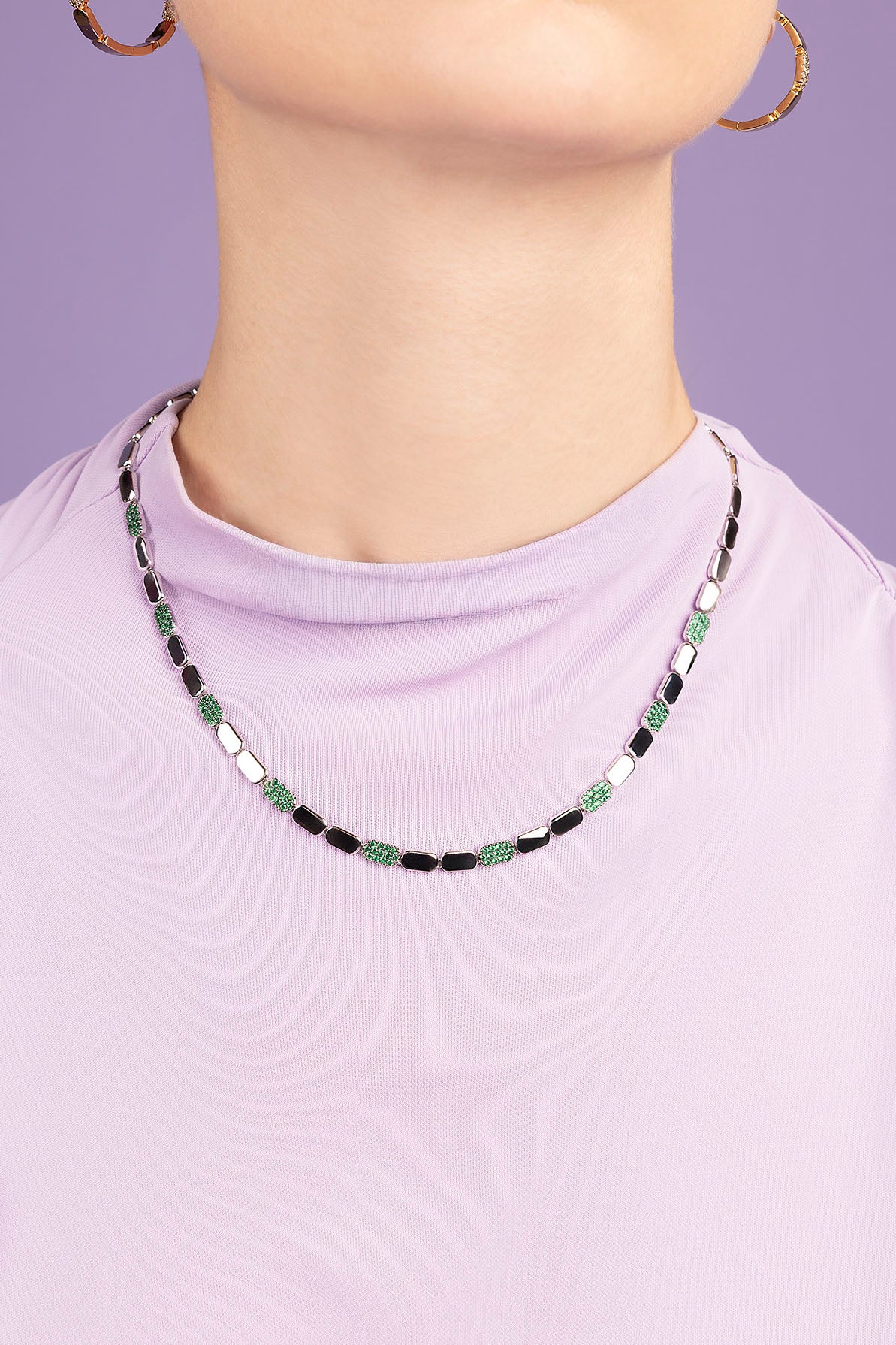 APM MONACO Dainty Adjustable Necklace worn by model on purple background