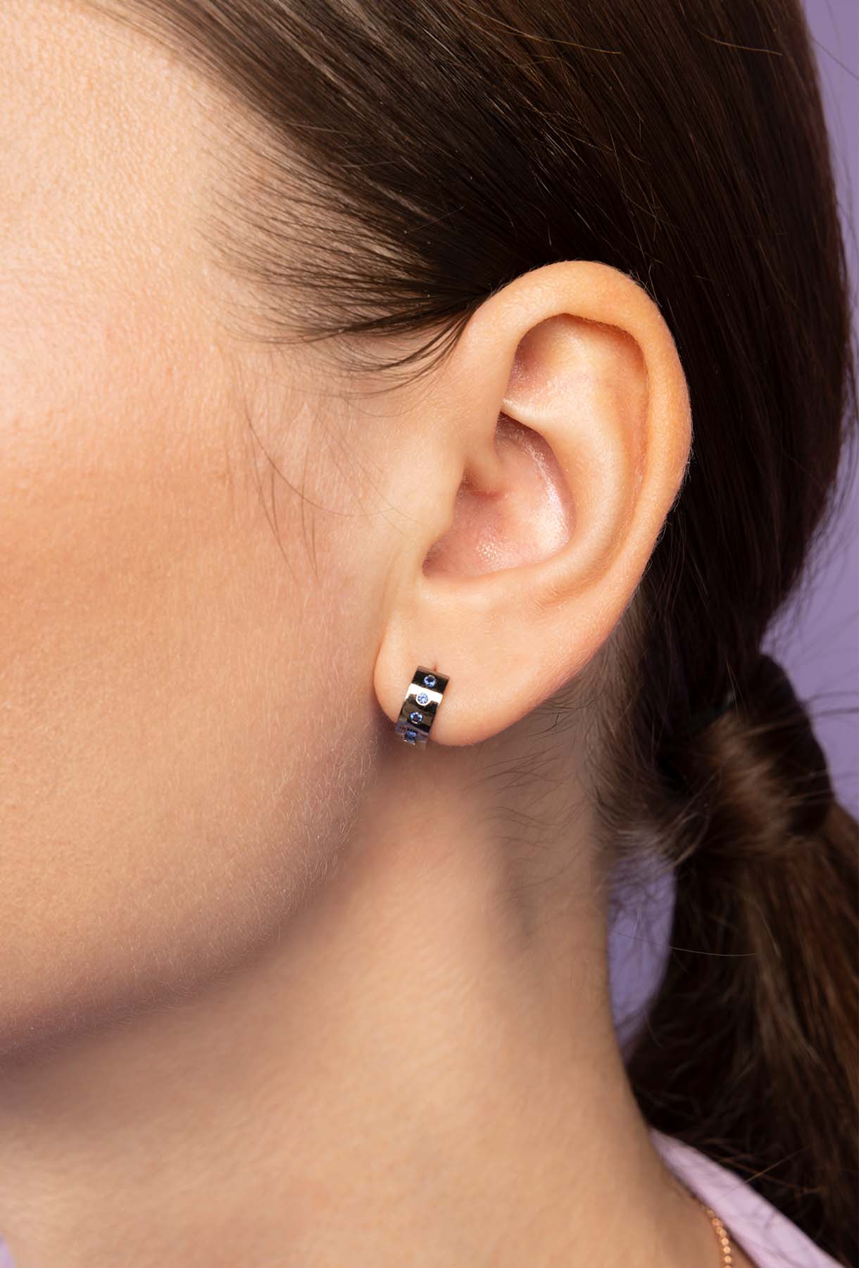 APM Monaco Love morse code earrings worn by model