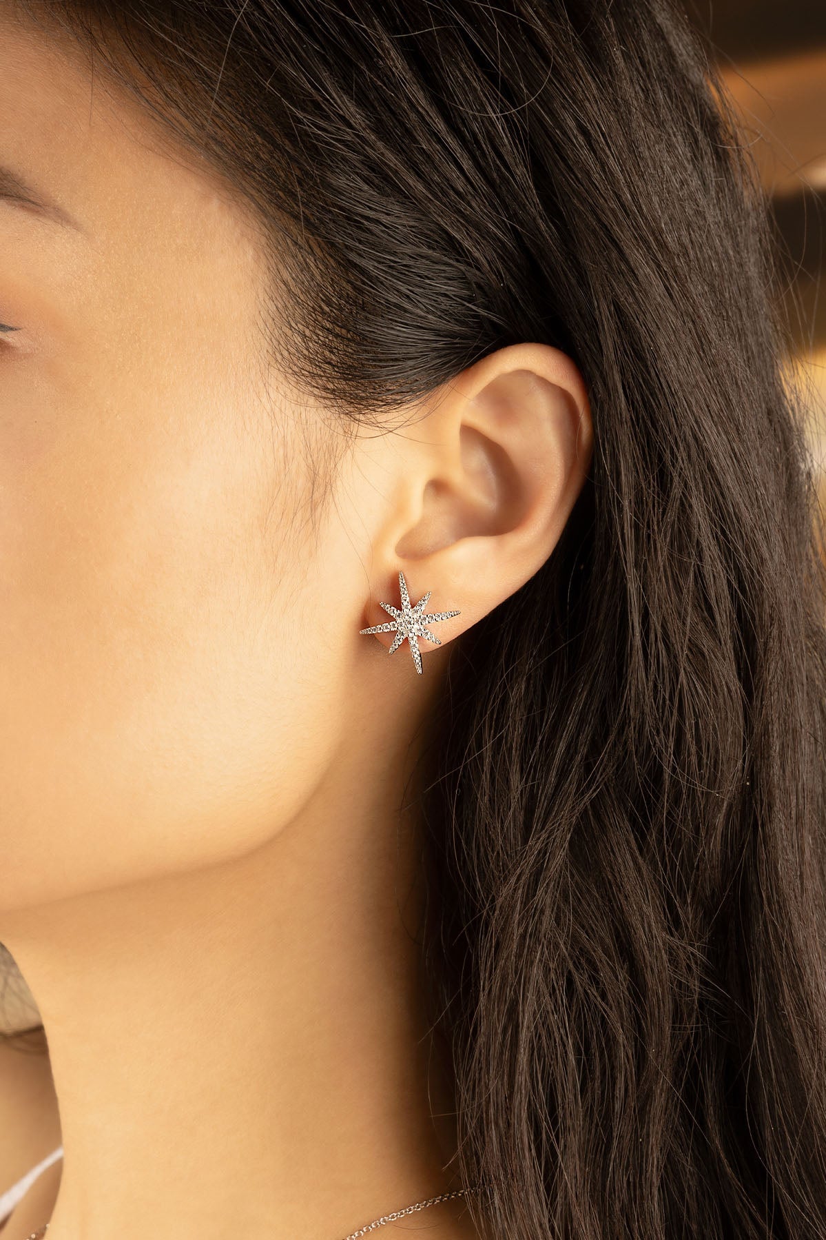 APM Monaco Météorites Silver Stud Earrings with Pearl in Silver worn on ear