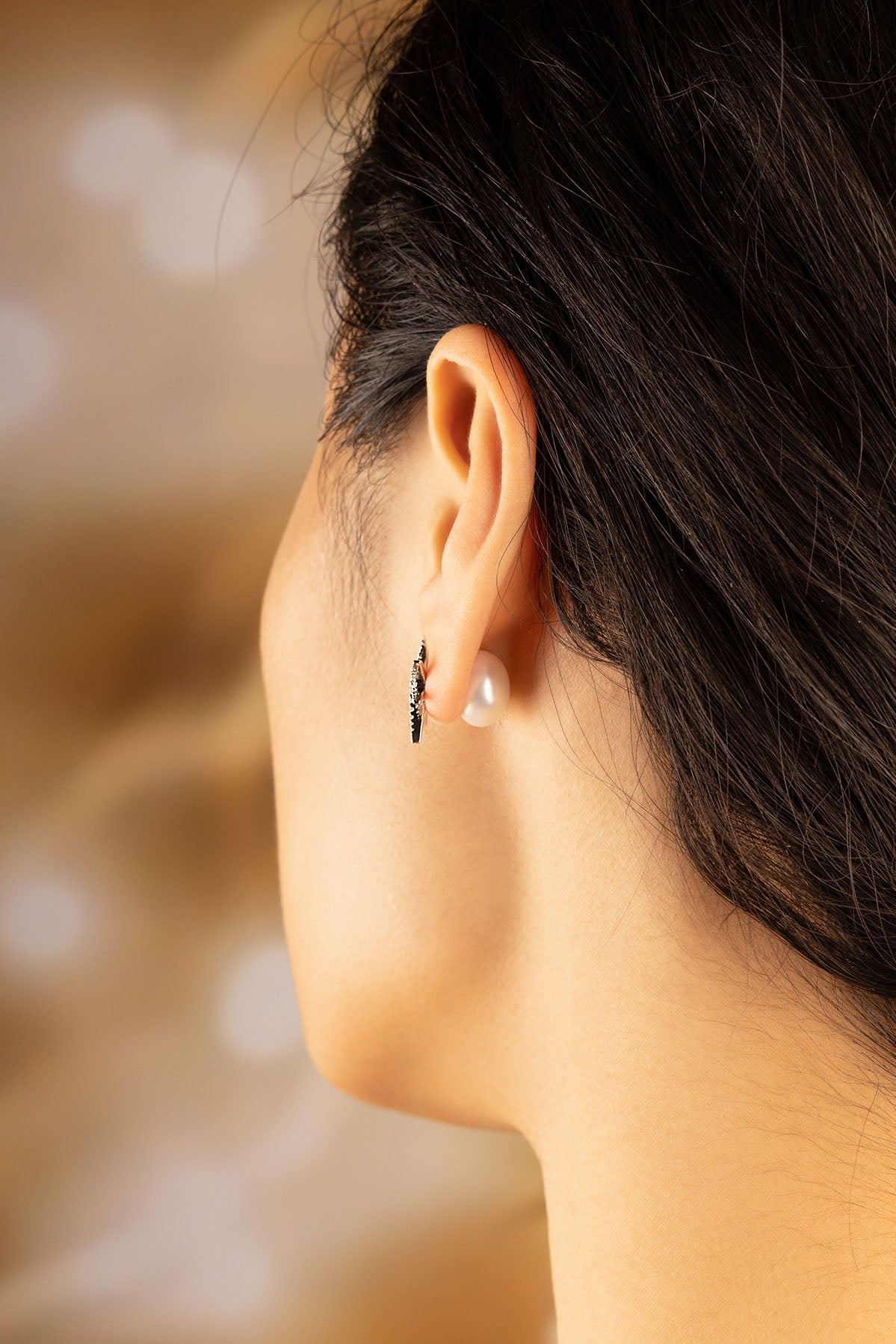 APM Monaco Météorites Silver Stud Earrings with Pearl in Silver worn on ear