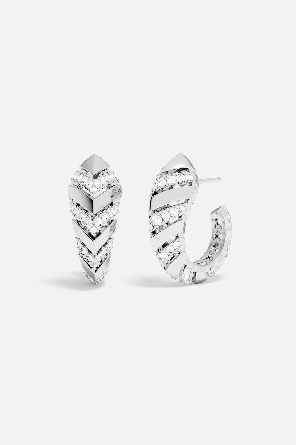 Pair of silver hoop earrings on a white background