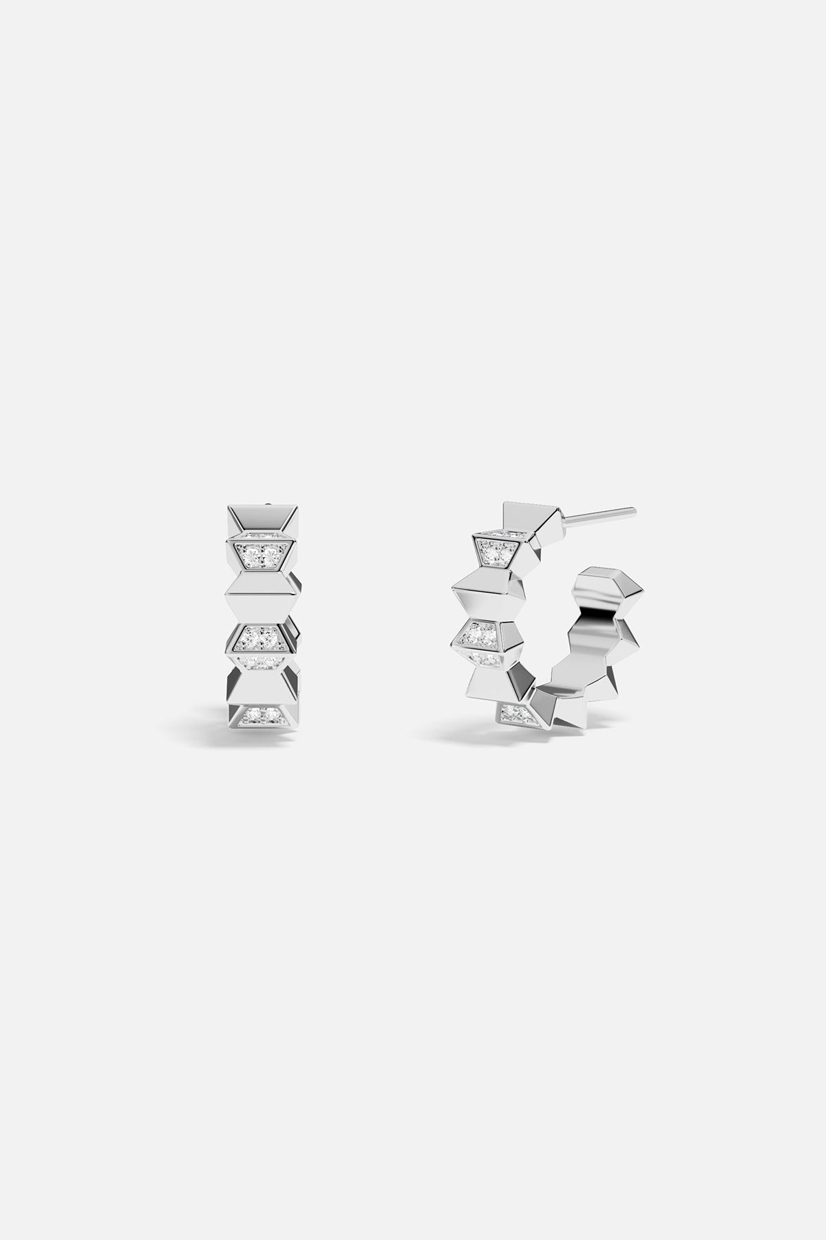 Pair of silver hoop earrings on a white background