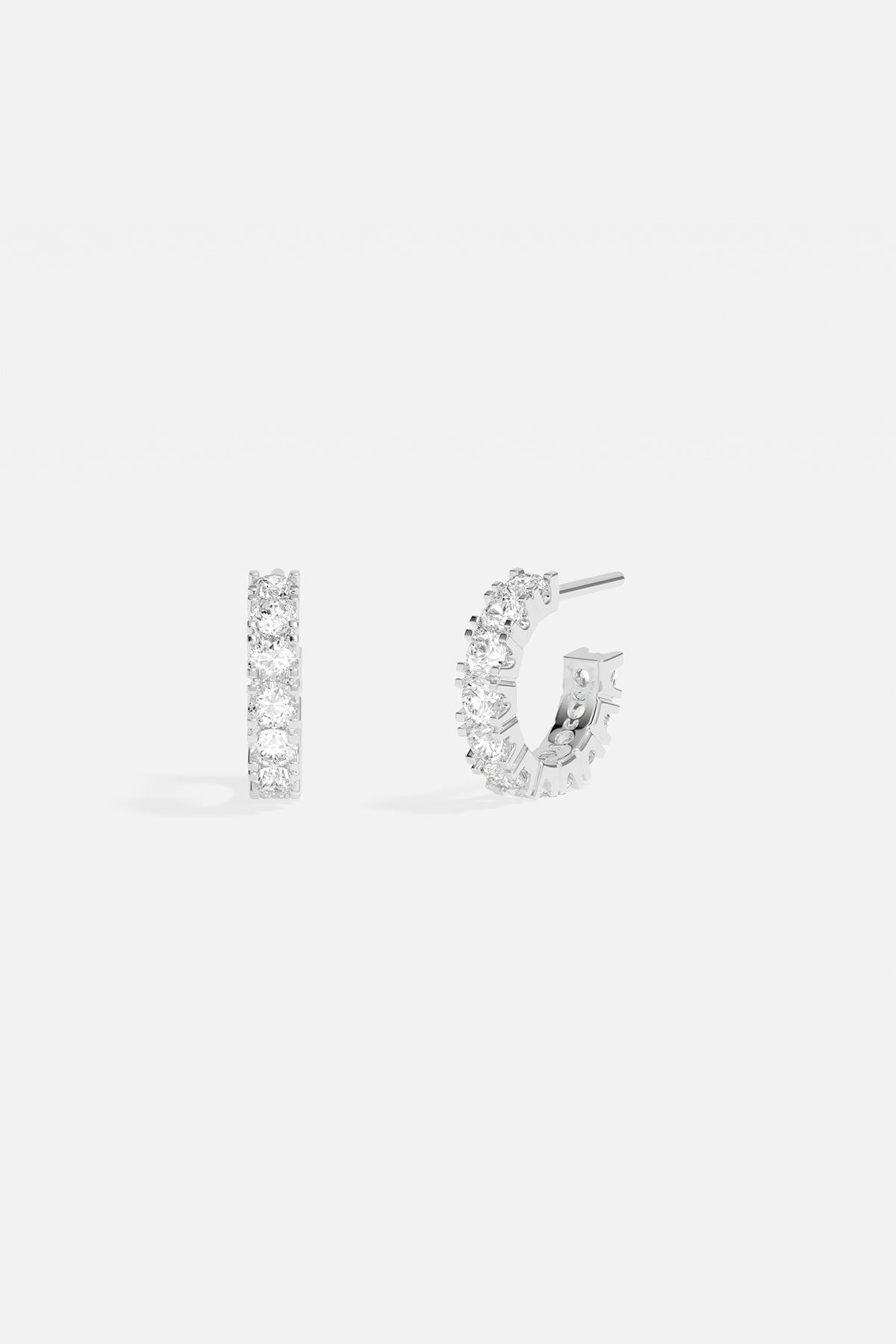 APM Monaco Pavé Huggie Earrings in Silver