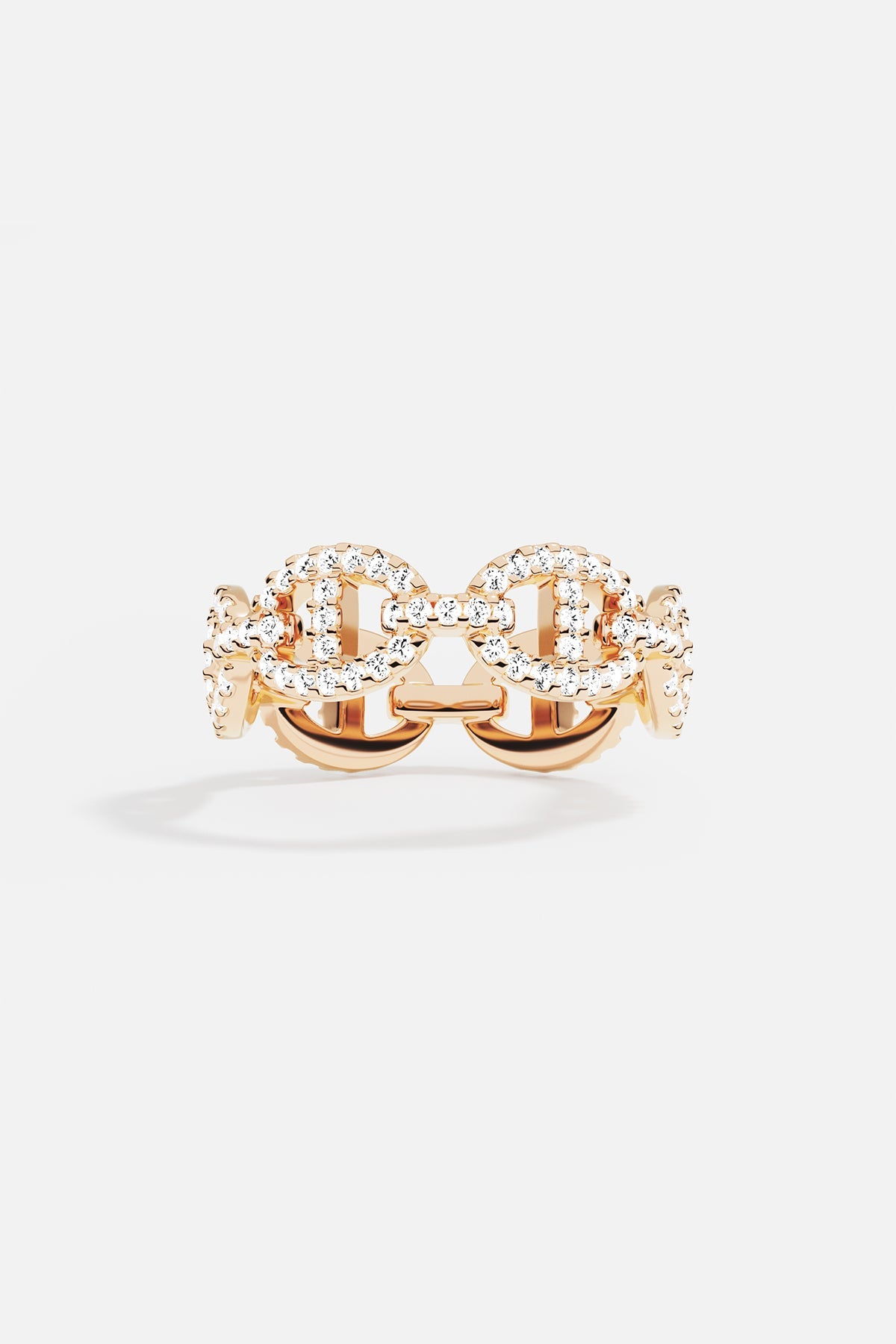 Rings APM Monaco rose gold maille marine ring with a distinctive linked chain design and pave white diamonds.