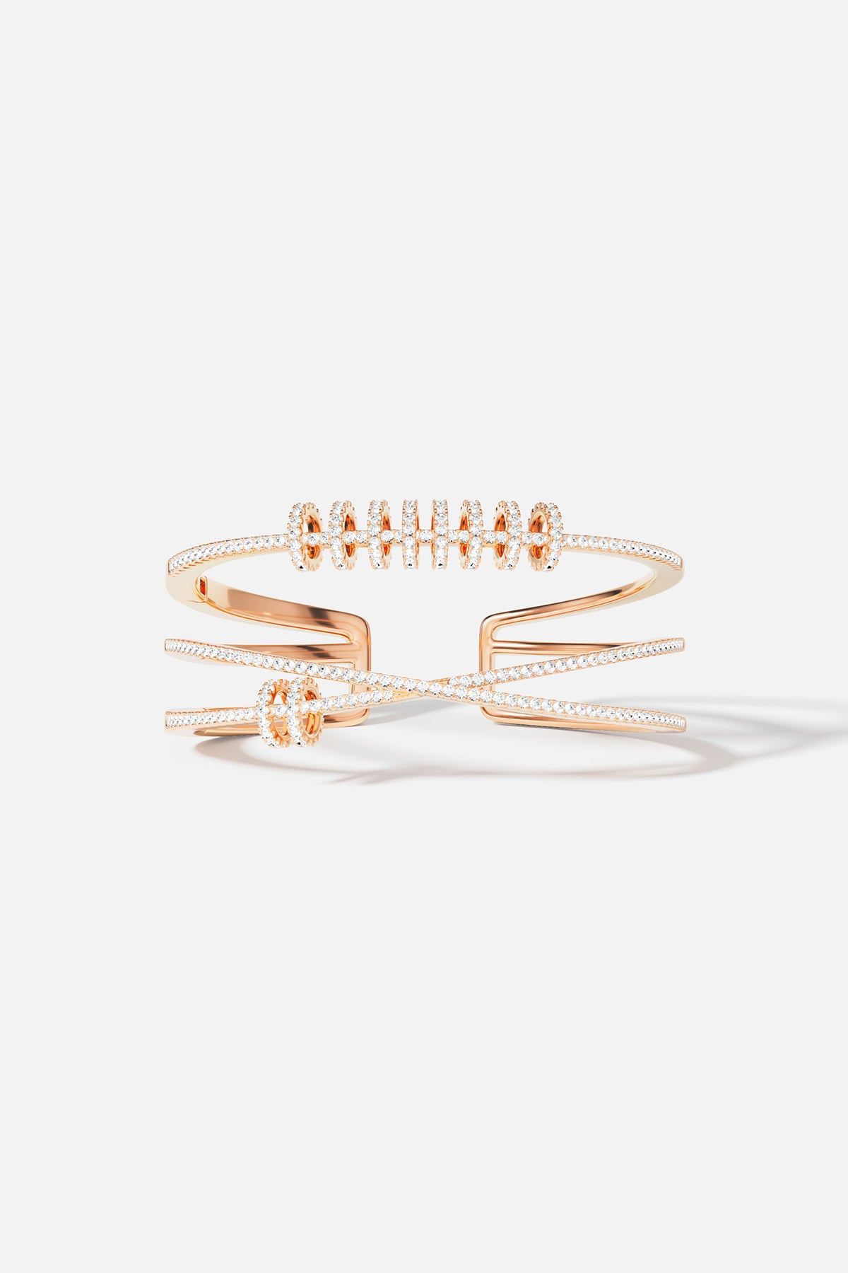 Bracelets APM Monaco gold triple open cuff with sliding rings and crystal accents.