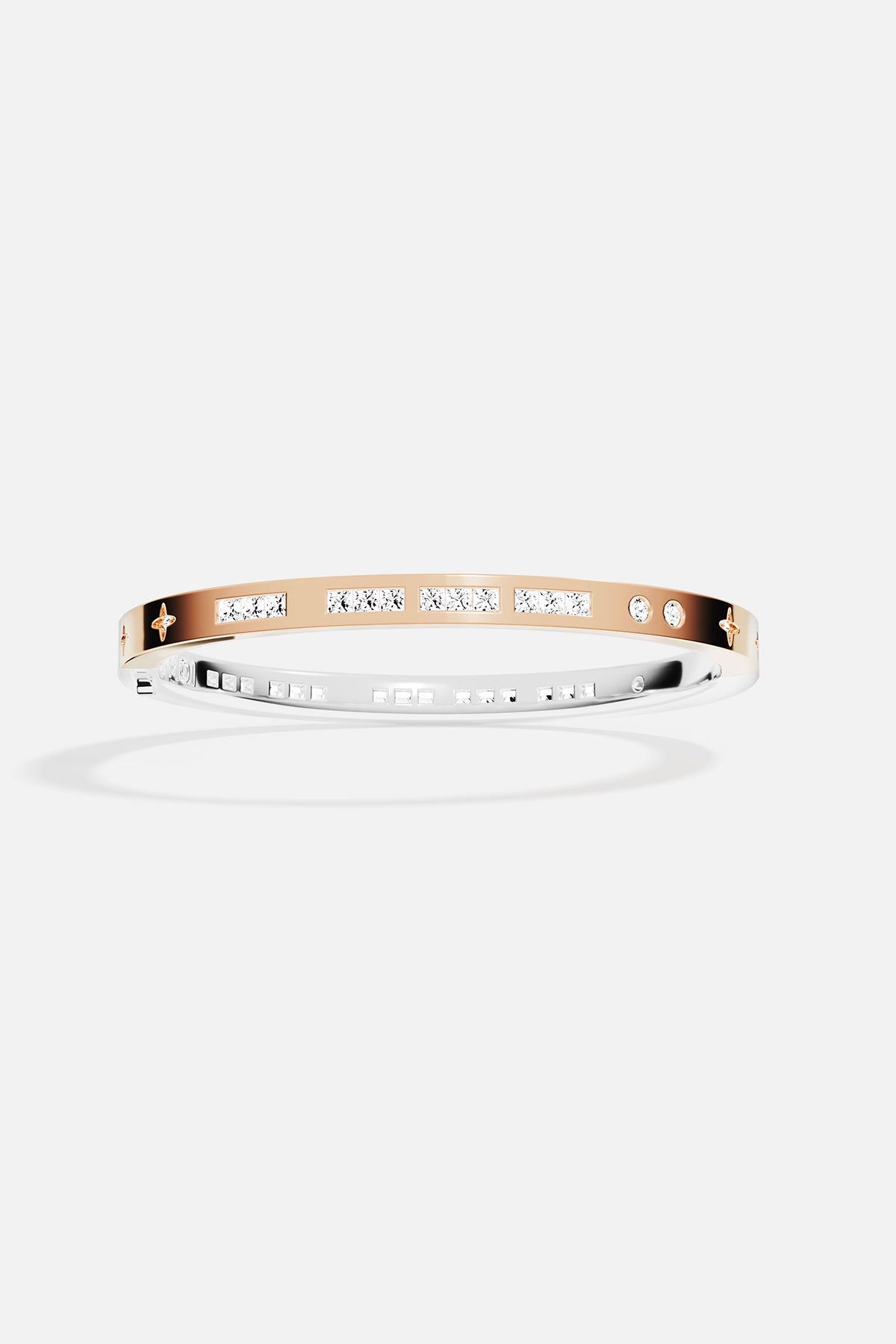 Rose gold bracelet with small stones on a white background