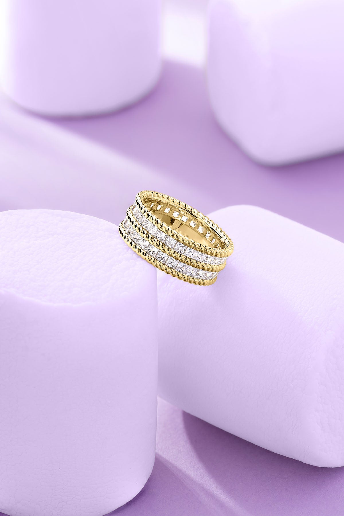 Statement Torsade Pavé Ring on a purple background