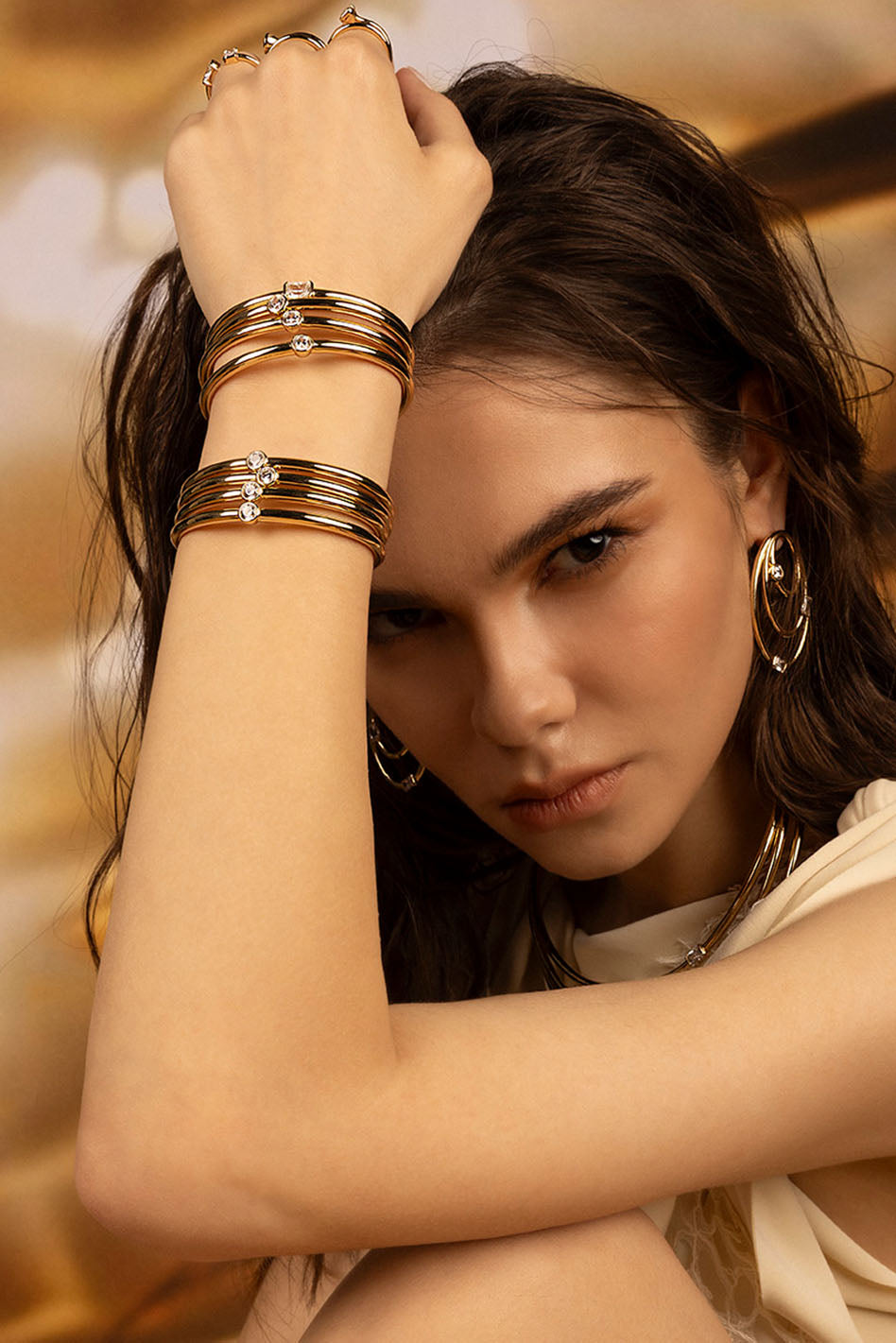 APM Monaco Éclat Cuff in Yellow Gold worn on hand