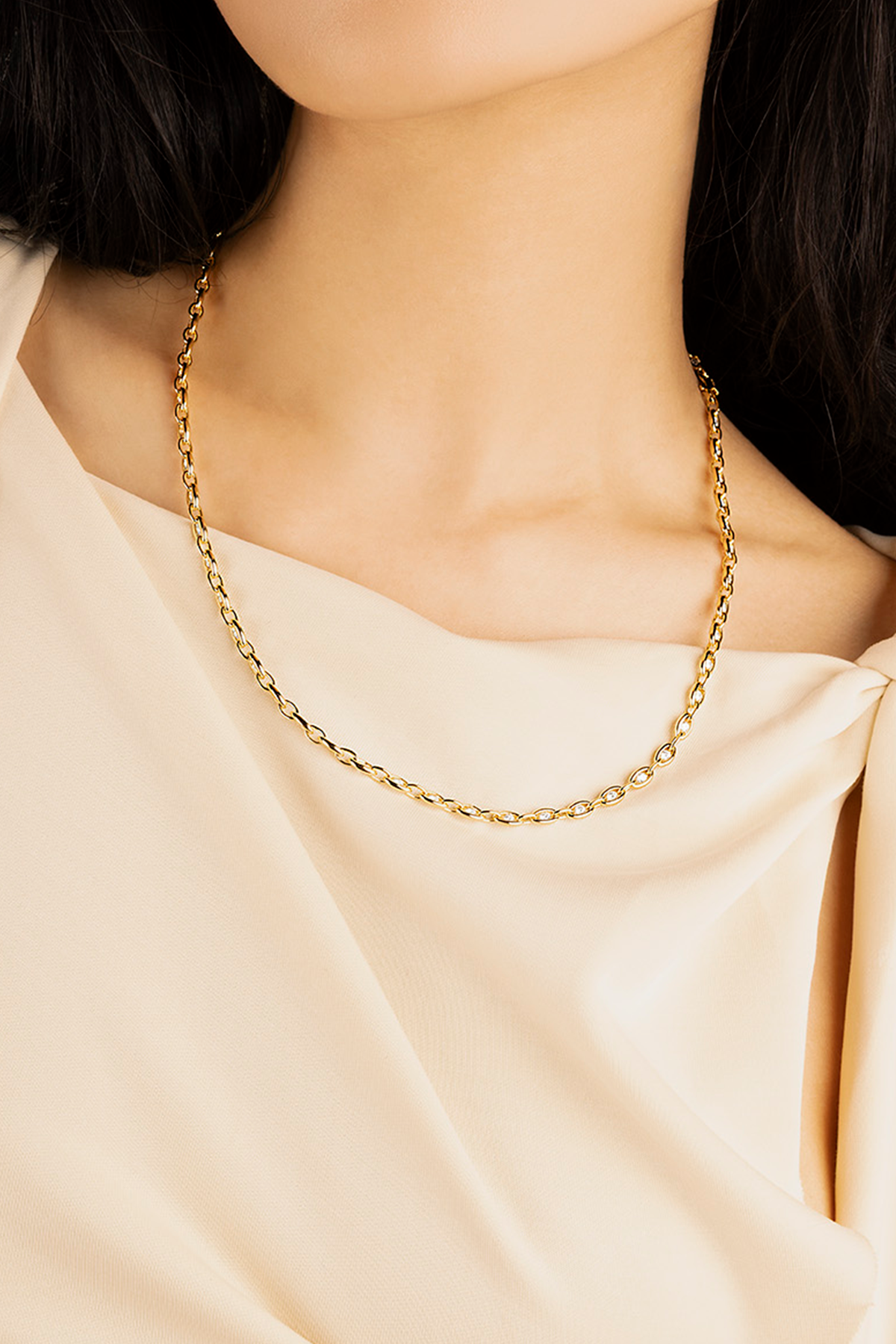 APM Monaco Pavé Chain Adjustable Necklace in yellow gold worn on neck