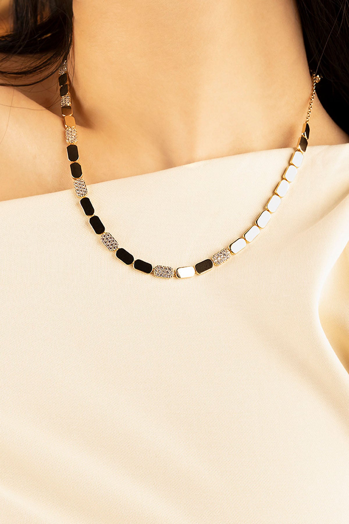 Gold with black on a plain background