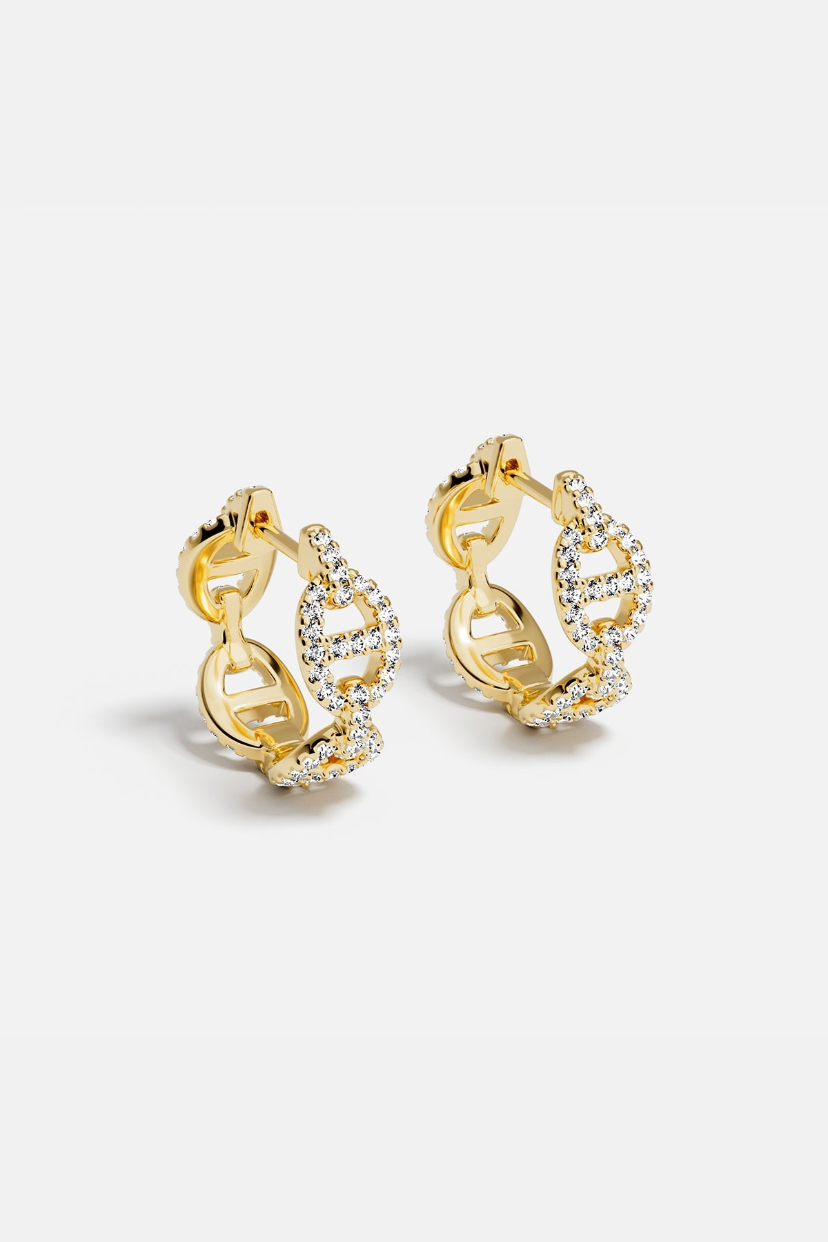 Earrings APM Monaco yellow gold maille marine hoop with white cubic zirconia.