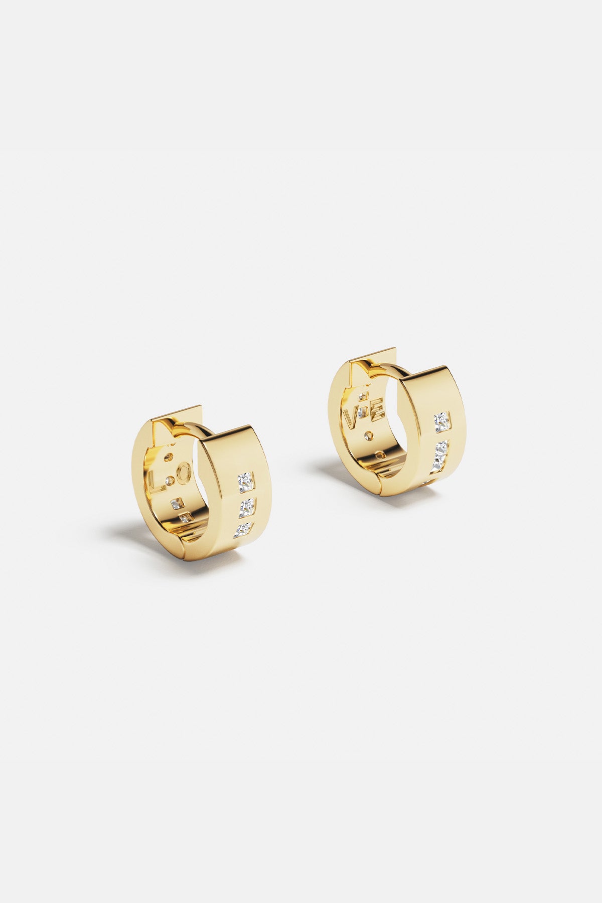APM Monaco LOVE Morse Code Huggie Earrings in Yellow Gold